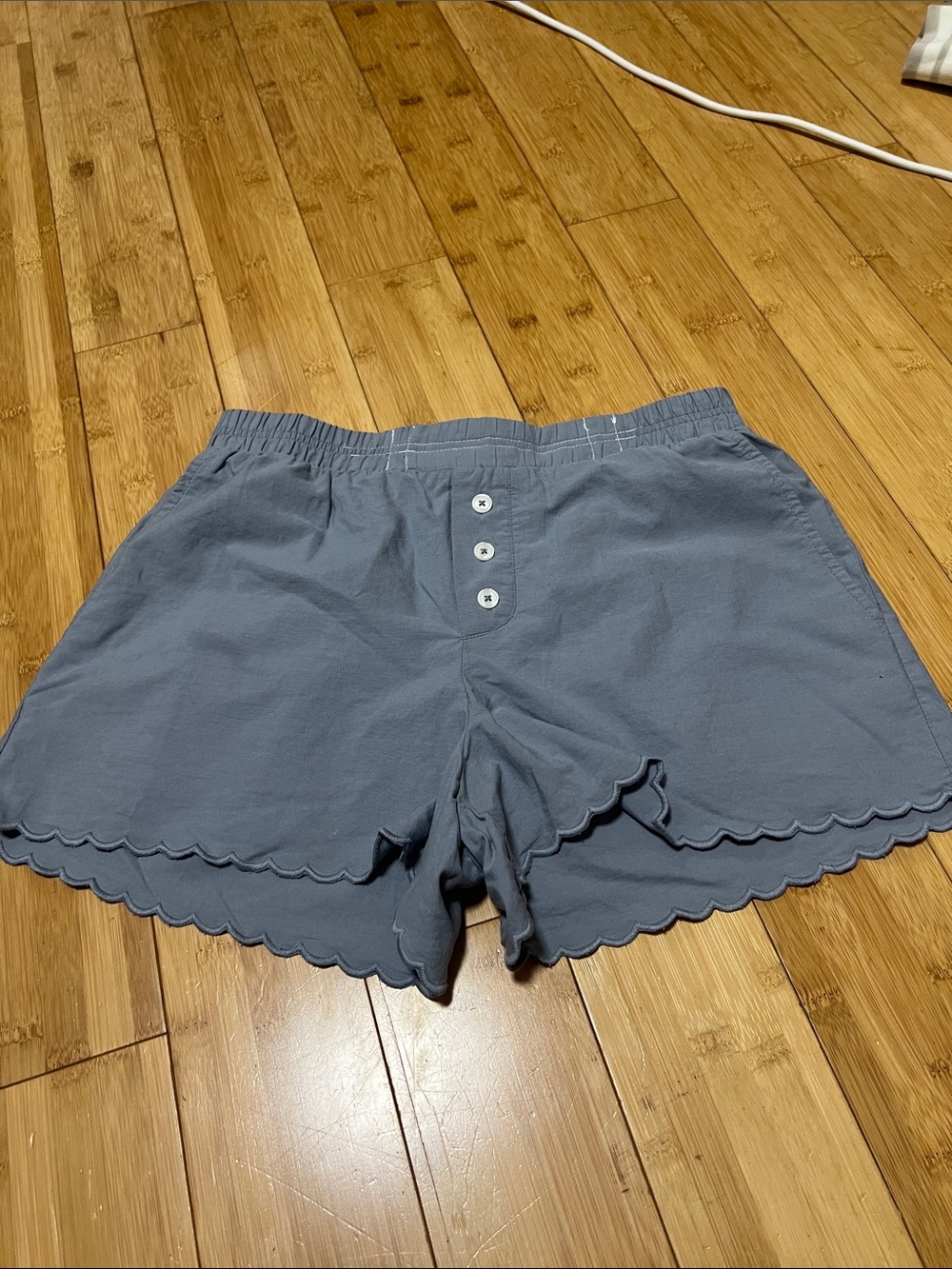 Women's Scalloped Hem Washed Blue Shorts